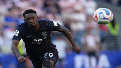 Folarin Balogun chases the ball during the World Cup round of 16 match against Belgium. (AP Photo) After all the drama... Balogun's controversial FIFA reprieve ends in World Cup heartbreak with little impact