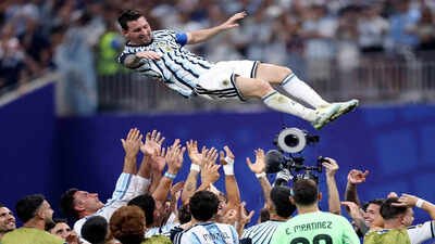 Watch: Tearful Lionel Messi lifted aloft as Argentina's locker room and Buenos Aires erupt after epic World Cup escape