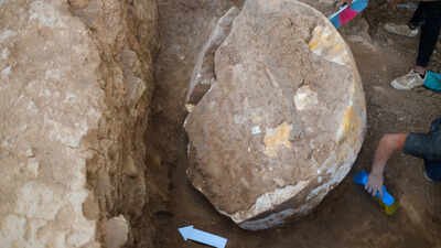 A fragment of an ancient stele dating to the reign of the Assyrian King Ashurbanipal found in Iraq's Nineveh province, July 17, 2026 Archaeologists in Iraq unearthed a rare 2,600-year-old Assyrian stele of King Ashurbanipal at Nineveh’s Shamash Gate, nearly a decade after ISIS damaged the ancient city