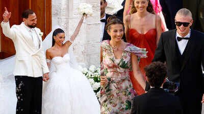 L-R: Gianluigi Donnarumma and his wife Alessia Elefante; Erling Haaland and his partner Isabel Haugseng Johansen. (Reuters Photo) WATCH: Erling Haaland brings viral 'Viking row' to Gianluigi Donnarumma's wedding as World Cup craze lives on