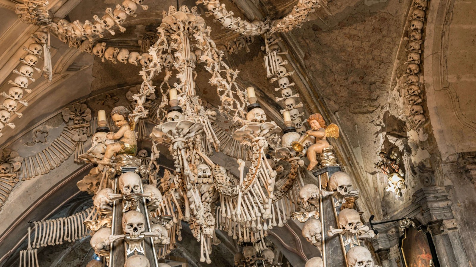 Chandelier made from human skulls and bones in Sedlec Ossuary in Kutná Hora