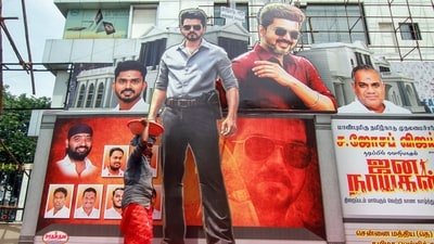 Giant cut-outs and banners installed by fans as actor-politician and Tamil Nadu Chief Minister Vijay's film Jana Nayagan opened to packed houses, in Chennai on Wednesday. (ANI Photo) (Lakshmi )