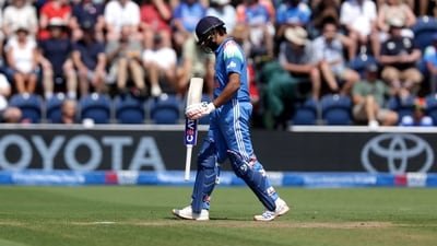 Rohit Sharma walks off the pitch after being caught out by England's Jos Buttler during the second ODI. (AP) Rohit Sharma walks off the pitch after being caught out by England's Jos Buttler during the second ODI. (AP)