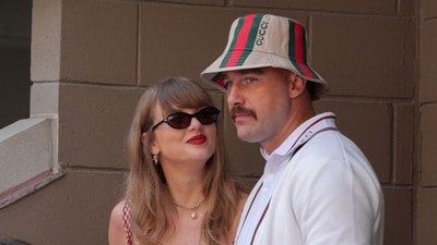 Taylor Swift and Travis Kelce have finally tied the knot. Adam Sandler officiated the ceremony, while Austin Swift and Jason Kelce took on key wedding roles. (Photo by TIMOTHY A. CLARY / AFP) (AFP)