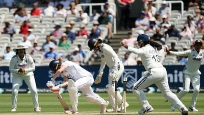 England's Lauren Bell gets bowled out by India's Deepti Sharma. (Action Images via Reuters)