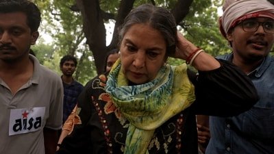 Shabana Azmi arrives at a protest site ahead of a planned march by supporters of India's Cockroach Janta Party towards the Parliament on the opening day of its monsoon session. REUTERS/Bhawika Chhabra (REUTERS)
