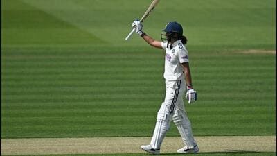 India's Harmanpreet Kaur celebrates reaching her 50 against England on the first day of the first Women's cricket Test at Lord's cricket ground in London. (AFP) India's Harmanpreet Kaur celebrates reaching her 50 against England on the first day of the first Women's cricket Test at Lord's cricket ground in London. (AFP)