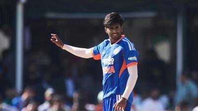 India's bowler Mayank Yadav gestures as he prepares to bowl during the first T20 cricket match between Zimbabwe and India in Harare, Zimbabwe. (AP Photo)