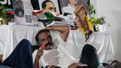 Actor Prakash Raj rests ahead of Cockroach Janata Party's (CJP) protest march, at Jantar Mantar, in New Delhi. (PTI) Actor Prakash Raj rests ahead of Cockroach Janata Party's (CJP) protest march, at Jantar Mantar, in New Delhi. (PTI)