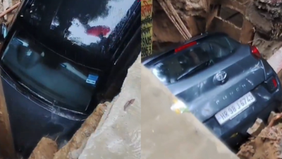 A residential road in Vasundhara Sector 13 collapsed into a large pit after heavy rainfall. 3-year-old drowns, road caves in, car falls into pit as heavy rain inundates Ghaziabad, Noida