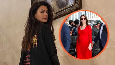 Anne Hathaway reacts after wearing maternity jumpsuit backwards: "I did?"