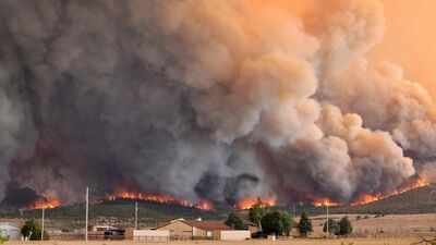 The Aspen Acres fire engulfs a hillside near Beulah (AP) Watch: Thousands forced to evacuate as wildfire rages across Colorado