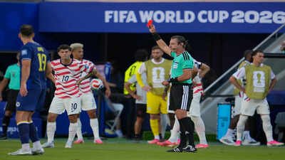 Referee Raphael Claus shows the red card to United States' Folarin Balogun, unseen, during the World Cup Round of 32 match. (AP Photo) FIFA World Cup: Will Folarin Balogun miss USA's Round of 16 clash vs Belgium after red card? Rules explained