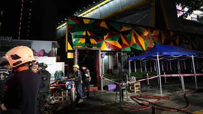 Rescuers work at the site of a fire in Bangkok, Thailand (Picture credit: AP) Thailand fire horror: At least 27 dead after midnight blaze tears through Bangkok pub