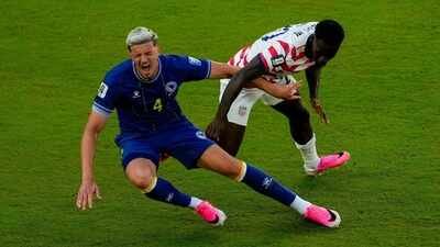 United States' Folarin Balogun (20) fouls Bosnia's Tarik Muharemovic (4) during the World Cup round of 32 football match in Santa Clara, Calif., near San Francisco, Wednesday, July 1, 2026. Balogun received a red card on the play. (AP Photo) Fresh twist in Folarin Balogun row: Belgium allowed to appeal FIFA's suspension decision before USA World Cup clash - what it means