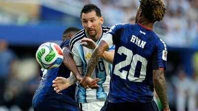 Argentina's Lionel Messi (10) battles with Cape Verde's Deroy Duarte (14) and Ryan Mendes (20) during the World Cup round of 32 football match between Argentina and Cape Verde in Miami Gardens, Fla., Friday, July 3, 2026. (AP Photo) 'We lost the ball, we sat back': Unimpressed Lionel Messi points to 'many bad things' after Argentina survive Cape Verde scare