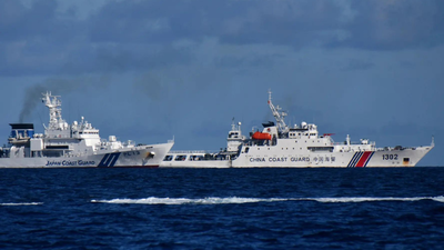 A China Coast Guard vessel sails near a Japan Coast Guard vessel around a group of disputed islands (Picture credit: Reuters) East China Sea tensions flare: Japan, China clash in high-stakes maritime standoff near disputed Senkaku Islands