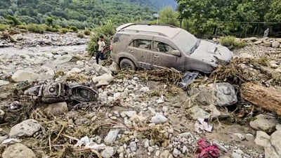 File photo: Vehicles lie damaged after a flash flood triggered by a cloudburst sweeps through the area, in Pahalgam (Picture credit: PTI) Jammu and Kashmir: Pahalgam cloudburst damages hotels, huts, washes away road; tourists moved to safety