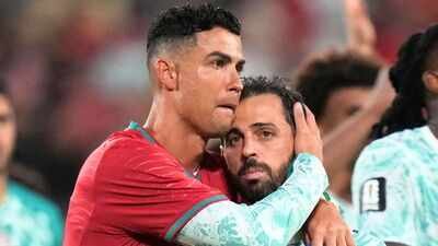 Cristiano Ronaldo with Portugal teammate Bernardo Silva (AP Photo) 'We know he is present with us': Cristiano Ronaldo, Portugal teammates pay emotional tribute to Diogo Jota after 2-1 win over Croatia