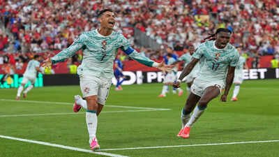 Portugal's Cristiano Ronaldo (7) celebrates after scoring their opening goal. (AP Photo) Cristiano Ronaldo scripts history, becomes oldest World Cup knockout goalscorer as Portugal beat Croatia