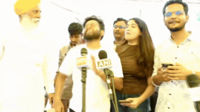 Dipke as he got news of Dharmendra Pradhan's resignation Watch: CJP's Abhijeet Dipke falls on stage after being told Dharmendra Pradhan has resigned