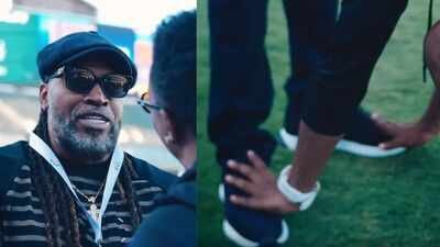 Dwayne Bravo touches Chris Gayle's feet (Screengrabs) Watch: Dwayne Bravo touches Chris Gayle's feet, calls him 'Original GOAT' at MLC