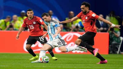 Argentina's Lionel Messi battles for the ball with Egypt's Mostafa Zico. (AP Photo) 'The tournament is fixed': Egypt star alleges 'clear and obvious injustice' after Argentina defeat