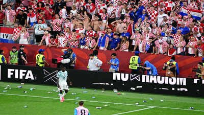 Croatia fans toss bottles and cans on the field after a Croatia goal was disallowed (AP/PTI) Watch: Croatia fans throw bottles onto the pitch after VAR drama denies last-minute equaliser vs Portugal