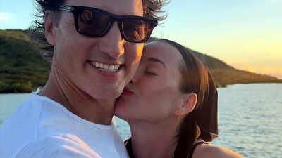 Justin Trudeau and Katy Perry pack on the PDA during yacht date; politician applies sunscreen inside singer's top in VIRAL pics