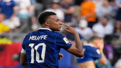 France's Kylian Mbappe reacts after scoring his side's opening goal during the World Cup round of 32 soccer match between France and Sweden in East Rutherford, N.J., near New York, Tuesday, June 30, 2026. (AP Photo/Seth Wenig) Kylian Mbappé shatters World Cup history, breaks 20-year record and now chases Messi after Sweden brace