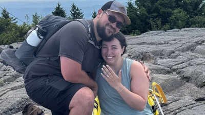 Photo credit : Courtesy of New Hampshire Fish and Game A New Hampshire hiker injured her leg on Mount Kearsarge and had to be carried down in a rescue stretcher, but the rescue turned romantic when her partner proposed