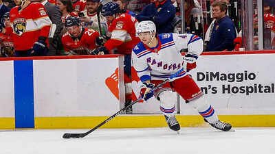 New York Rangers defenseman Braden Schneider Skates with the puck during an NHL game between the New York Rangers and the Florida Panthers (Photo by Chris Arjoon/Icon Sportswire via Getty Images) New York Rangers remain open to trading defenseman Braden Schneider despite new NHL contract