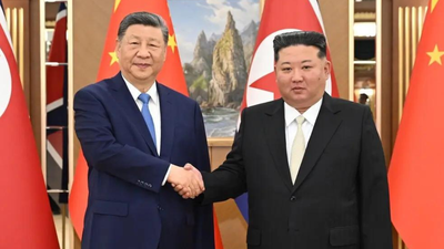 File photo: Chinese President Xi Jinping (left) with North Korean leader Kim Jong Un (Picture credit: AP) Xi Jinping says ready to work with Kim Jong Un for 'long-term, sound and stable' China-North Korea ties