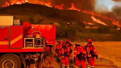 Firefighters work to contain Spain's largest blaze of the year 16,000 hectares burned, over 1,100 evacuated: Spain's largest wildfire rages on