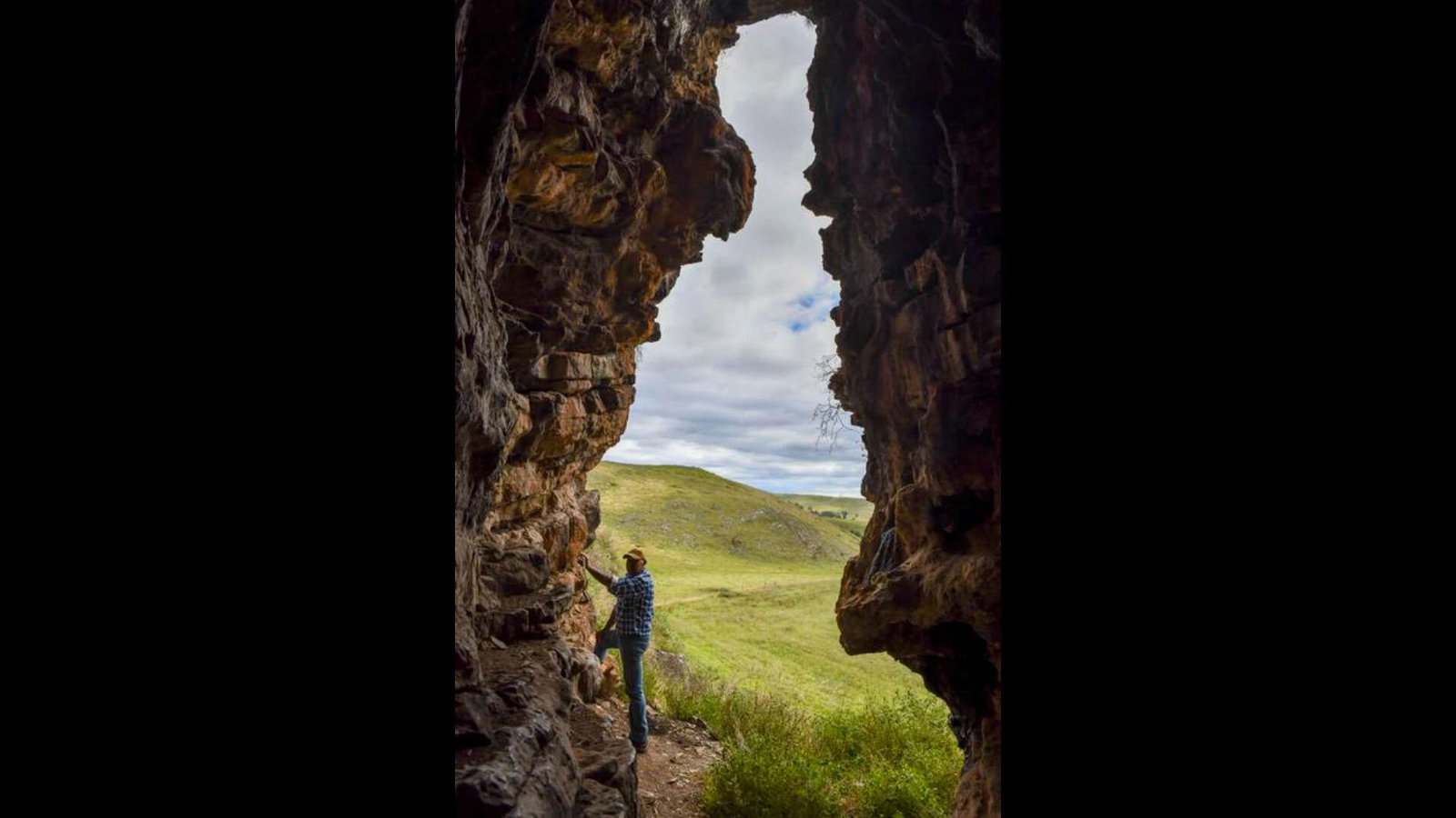 <p style="line-height: 23px">GunaiKurnai Elder Uncle Russell Mullett at the cave entrance of Cloggs Cave</p><br>