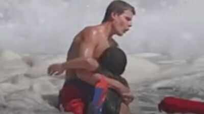 California rookie lifeguard Ryder Williams saved a 10-year-old from 10-foot waves in his first rescue; after his shift, the 16-year-old helped save two more people and won Trump’s praise