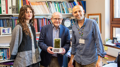 The Cambridge team behind the living algae-powered bio-battery: Lucia Giron, Dr Paolo Bombelli and Professor Chris Howe. Cambridge scientists create a living bio-battery that generates electricity around the clock using algae and could replace millions of disposable batteries