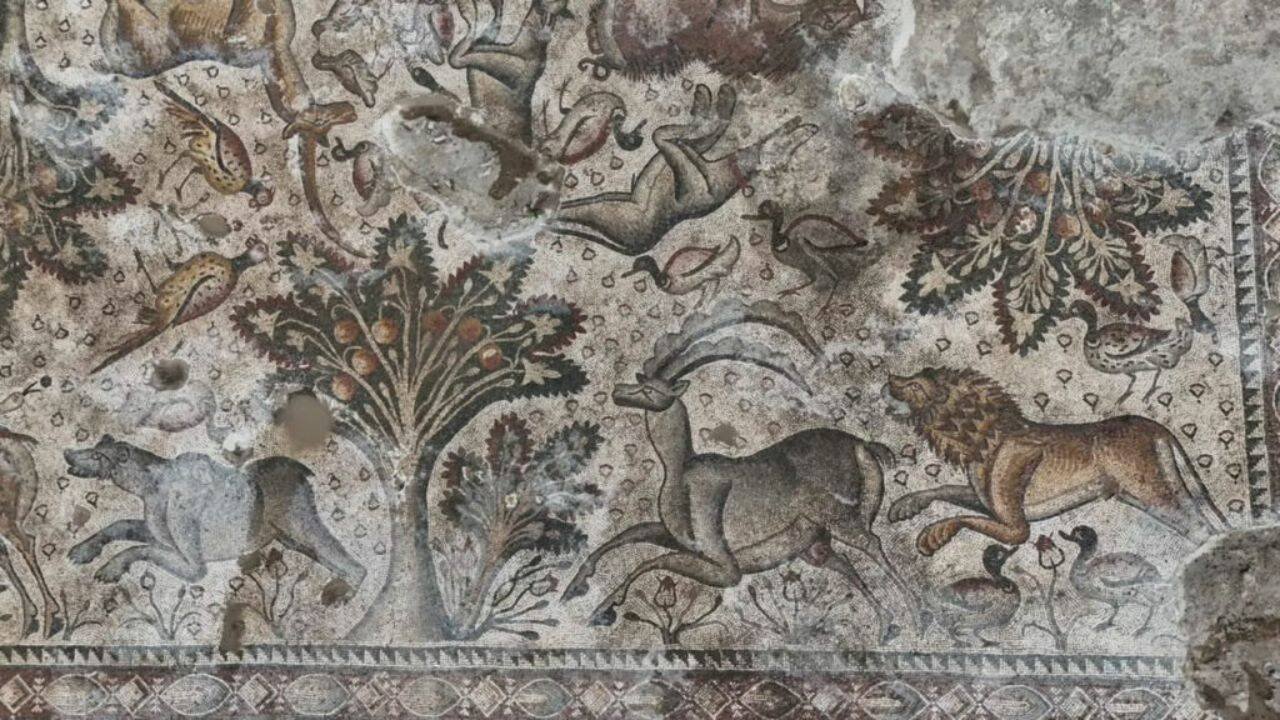 The mosaic depicts flora and fauna