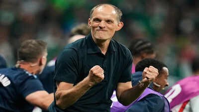 England head coach Thomas Tuchel reacts after the World Cup Round of 16 match against Mexico. (AP Photo) 'Maybe, that's a good starting point': England's Tuchel jokes Kane could ask Trump over Quansah's red card