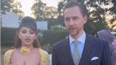 Urvashi with Tom in the video