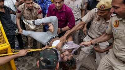 Security personnel stop a protestor near Jantar Mantar during a protest march, in New Delhi. 'Some issues belong to all of us': Abhinav Bindra urges to 'strengthen education system' amid student protests