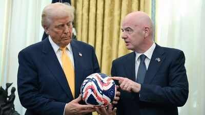 FIFA president Gianni Infantino, right, presents US President Donald Trump with the new FIFA Club World Cup official ball in the Oval Office of the White House in Washington, March 7, 2025. (AP file photo) UEFA threatens FIFA World Cup boycott over Gianni Infantino's private investors plan