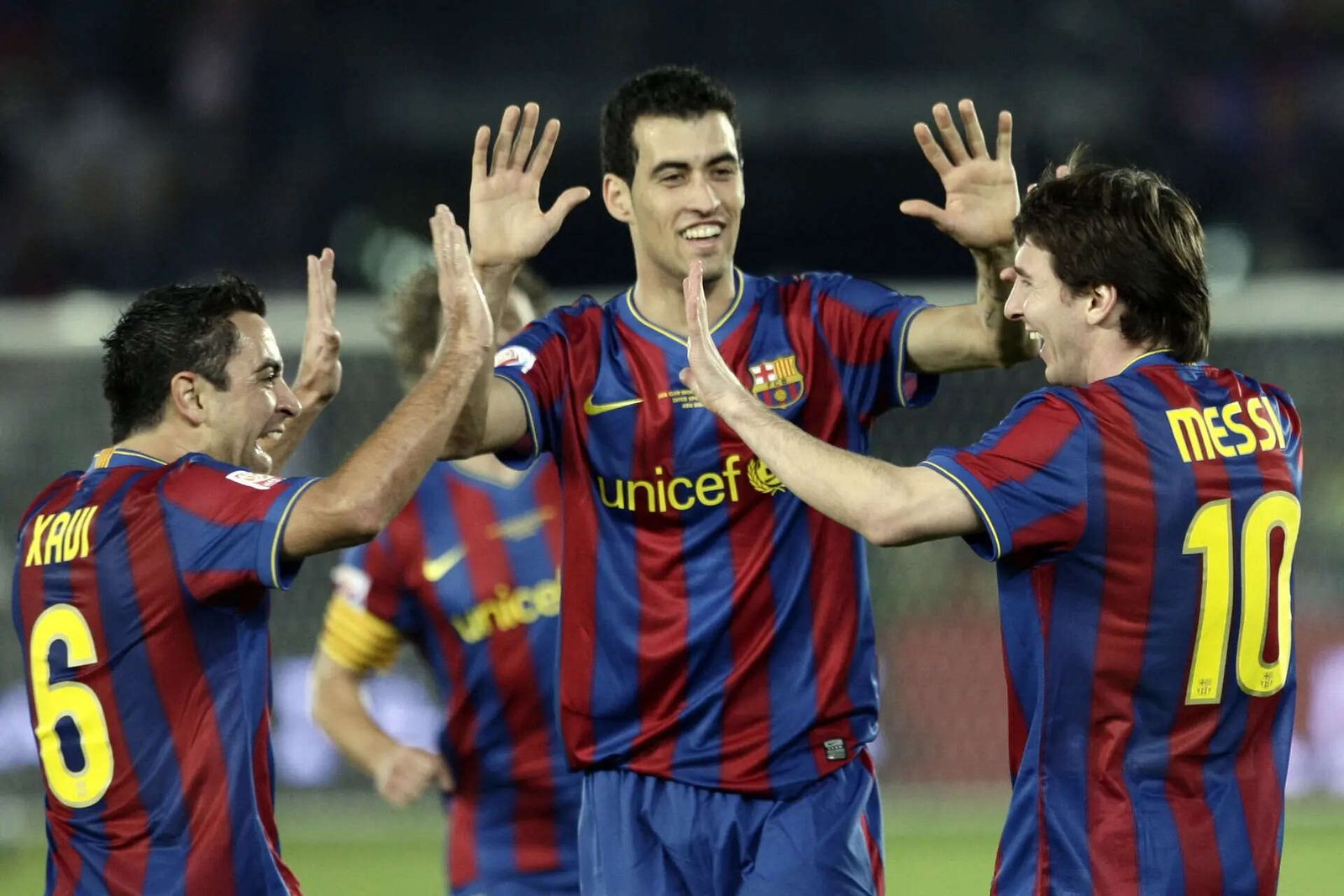 Xavi, Busquets, and Inietsa