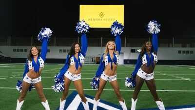 The Dallas Cowboys Cheerleaders will debut a historic update to their iconic uniform during the 2026 NFL season through an expanded partnership with Kendra Scott. The collaboration introduces the first standardized game-day jewelry as part of the squad's look and includes a fan collection inspired by Texas pride. The launch also highlights the growing influence of the cheerleaders beyond football, blending fashion, tradition and modern team branding. Dallas Cowboys Cheerleaders' iconic uniform gets its first historic update in years ahead of the 2026 NFL season