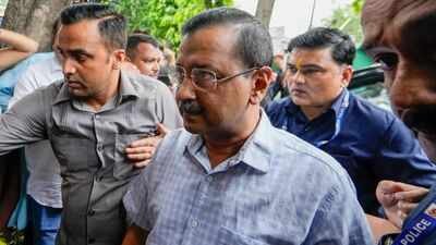 AAP chief Arvind Kejriwal and other party leaders stopped from marching to Prime Minister Narendra Modi's residence. (Photo: PTI) AAP protest E20 petrol policy: Kejriwal, Sisodia stage sit-in after march to PM Modi's residence stopped