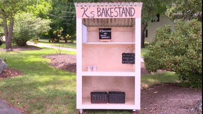 Father-son build new farm stand for woman after stand stolen on her first day of business A Cumberland mother's new farm stand was stolen before she could use it; strangers John and Casey Adams rebuilt it for free, even after their tools were stolen