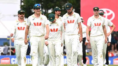 Australian captain Pat Cummins, leads his players from the field following their nine wicket loss to Banglade (Image via AP) ‘Very embarrassing defeat’: Ricky Ponting tears apart Australia after Bangladesh shock