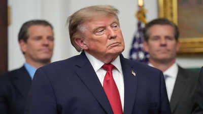 President Donald Trump listens as Gemini co-founder and president Cameron Winklevoss, left, and Gemini co-founder and CEO Tyler Winklevoss, right, watch, during a meeting with technology leaders in the Roosevelt Room of the White House, Wednesday, Aug. 19, 2026, in Washington. (AP Photo/Jacquelyn Martin) ‘Economic D-Day’: Trump says Iran to face ‘unprecedented economic warfare’