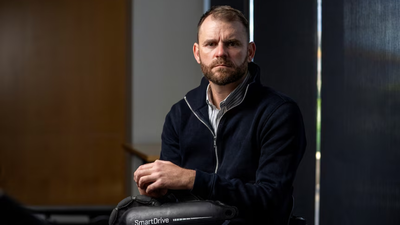 Disability advocate Shane Hryhorec was forced from an Adelaide flight due to issues with stowing his portable wheelchair motor. (ABC News: Lincoln Rothall) Virgin Australia removed a wheelchair user because his mobility device would not fit under his seat; airline later admitted the device had been incorrectly assessed