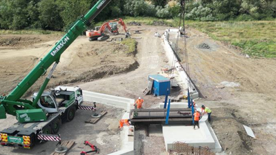 New swing bridge installed as major milestone reached for Wichelstowe canal An English town installed a six-metre swing bridge whose deck contains the equivalent of 140 recycled plastic bottles per square metre and can be manually opened for passing boats